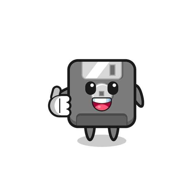 Mascotte del floppy disk che fa il gesto dei pollici in su, design carino