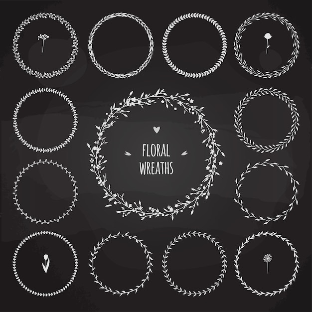 Floral wreath on a chalkboard Set of vector floral wreaths hand drawn with chalk