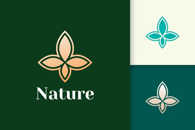 健康と美容のためのシンプルで豪華な葉の形の花のロゴ