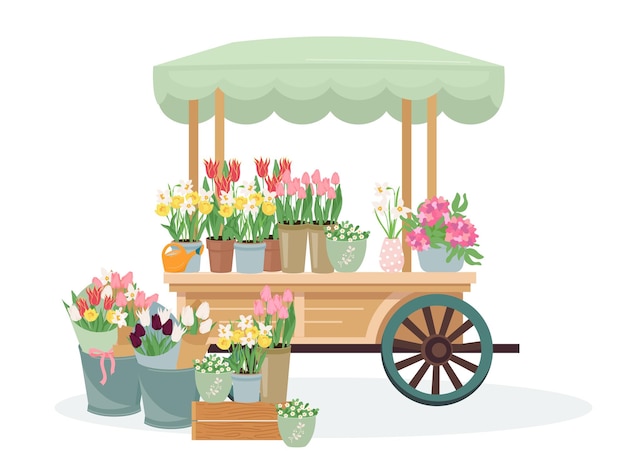 Flower market cart with early spring garden flowers in bouquets and pots for mothers day birthday