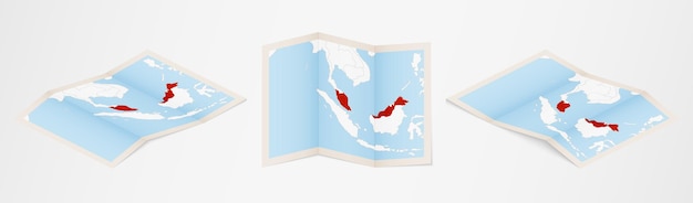 Mappa piegata della malesia in tre diverse versioni.