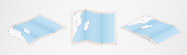 Folded map of Mauritius in three different versions.