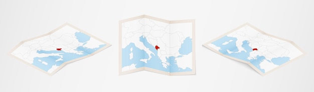 Mappa piegata del montenegro in tre diverse versioni.