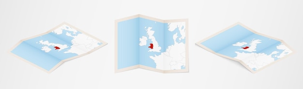 Folded map of wales in three different versions.