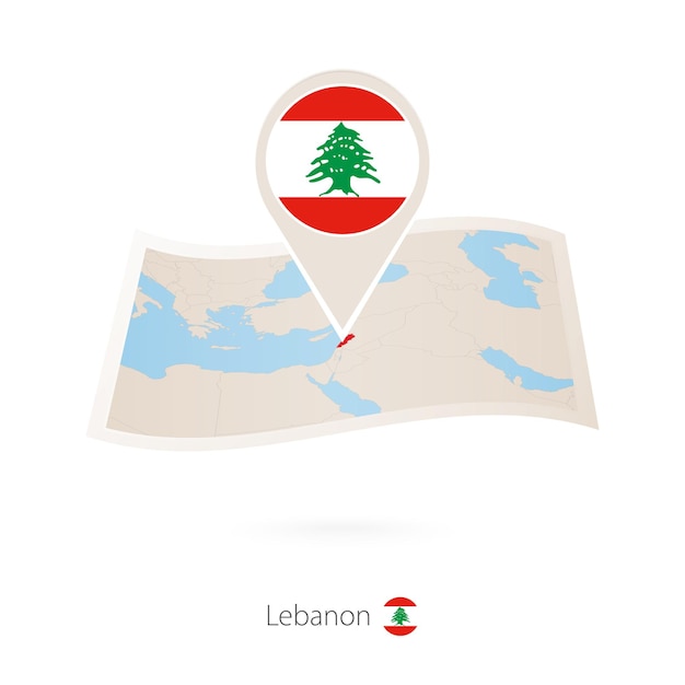 레바논의 국기 핀이 있는 레바논의 접힌 종이 지도