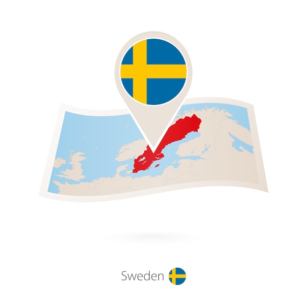 Folded paper map of Sweden with flag pin of Sweden