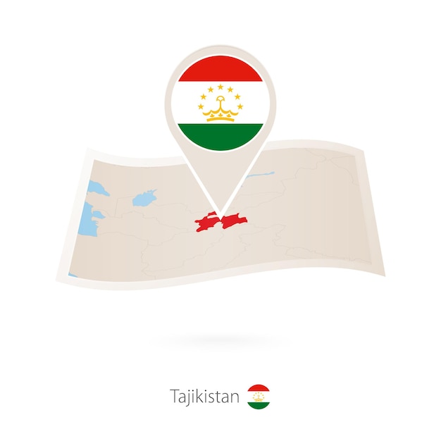 Folded paper map of Tajikistan with flag pin of Tajikistan