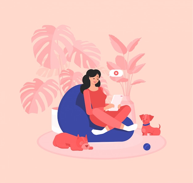 Freelancer girl is sitting in an armchair
