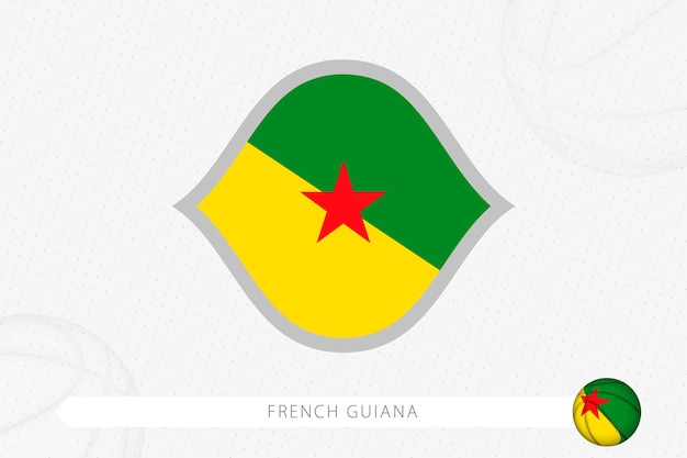 French guiana flag for basketball competition on gray basketball background.