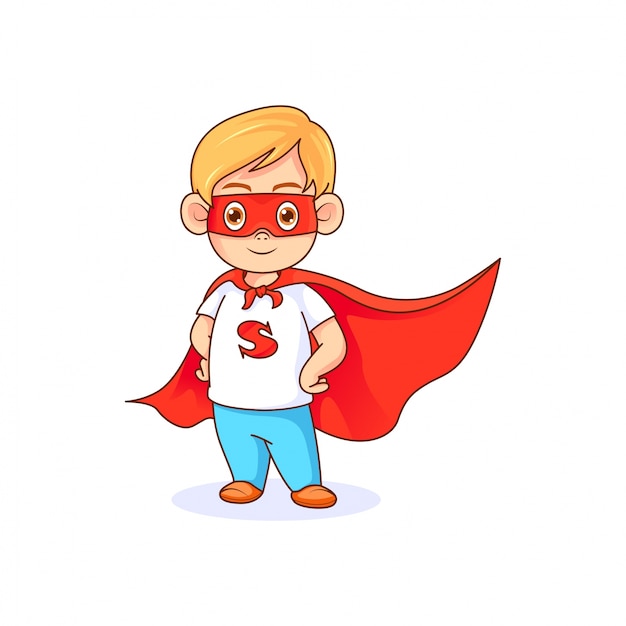 Funny little boy in superhero pose wearing red mask and red cape