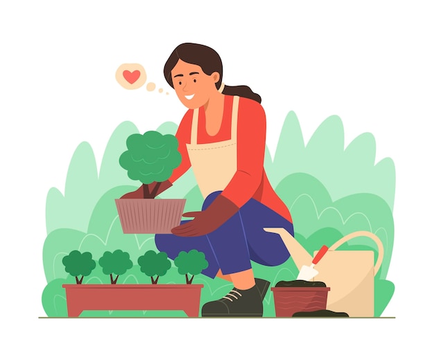 Gardener woman planting tree in garden