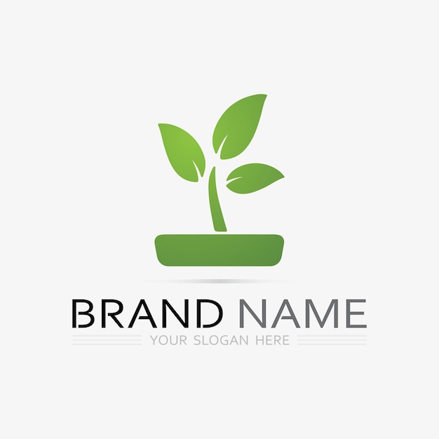 Vector gardening logo with shovel icon and tree with green leaves logo template