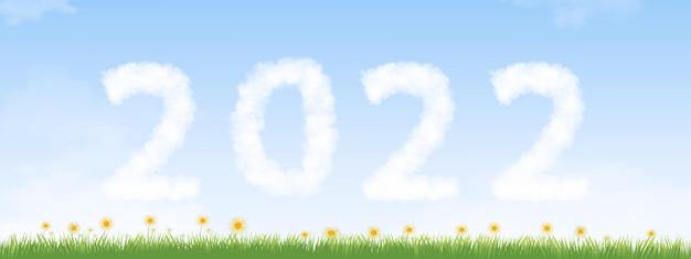 Vector gelukkig nieuwjaar bannerfluffy 2022 wolken op blauwe lucht en groen gras landschap vector kalender