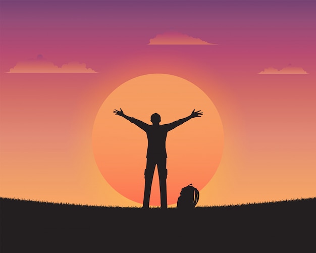 Gelukkig silhouet een mens van zonsondergangachtergrond