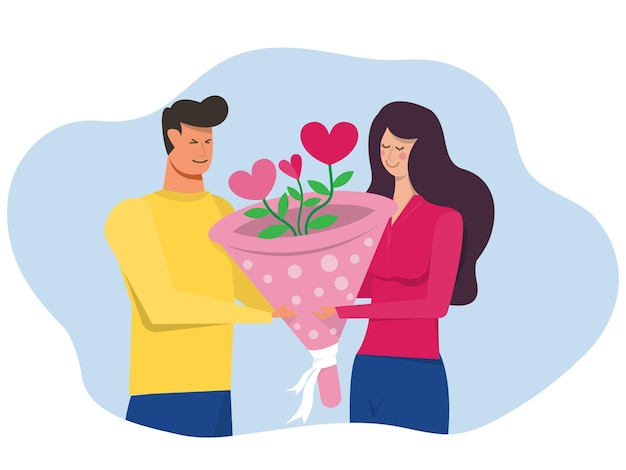 Gelukkige man die bloemhart geeft aan zijn mooie vriendin Echtpaar dat valentijnsdag viert