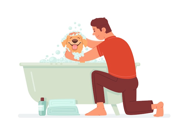 Gelukkige man wast de hond in de badkamer de man zorgt voor zijn huisdier hygiëne huisdier