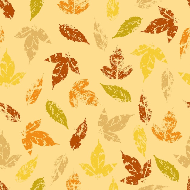 Gevallen herfstbladeren vector naadloze patroon stempels van natuurlijke bladeren verf op papier achtergrond voor stoffen prints verpakking en ansichtkaarten