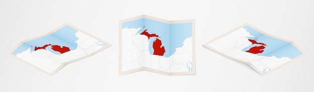 Gevouwen kaart van michigan in drie verschillende uitvoeringen.