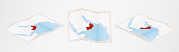 Gevouwen kaart van oman in drie verschillende uitvoeringen.