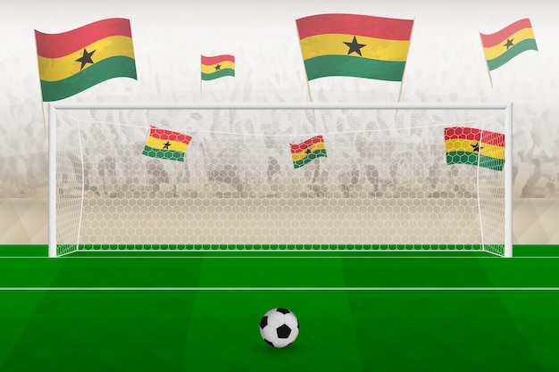 Tifosi della squadra di calcio del ghana con bandiere del ghana che incoraggiano il concetto di calcio di punizione dello stadio in una partita di calcio