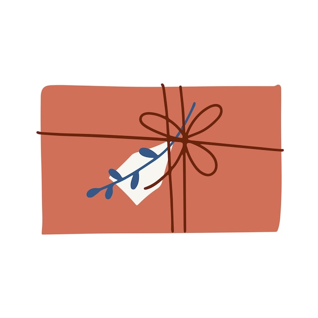 Confezione regalo legata con un filo con un ramoscello e tag vacanze invernali natale e capodanno