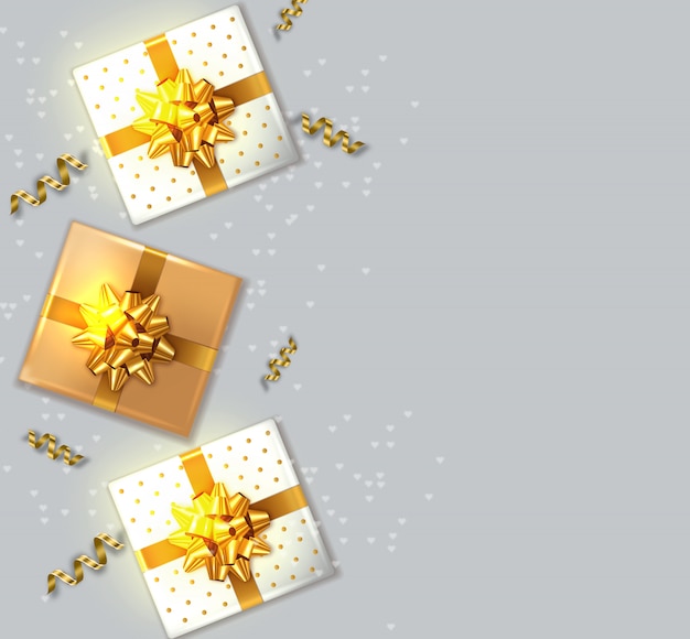 Vector gift boxes with golden bow