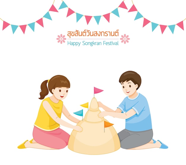 Girl and boy building sand pagoda together tradition thai new year suk san wan songkran translate happy songkran festival