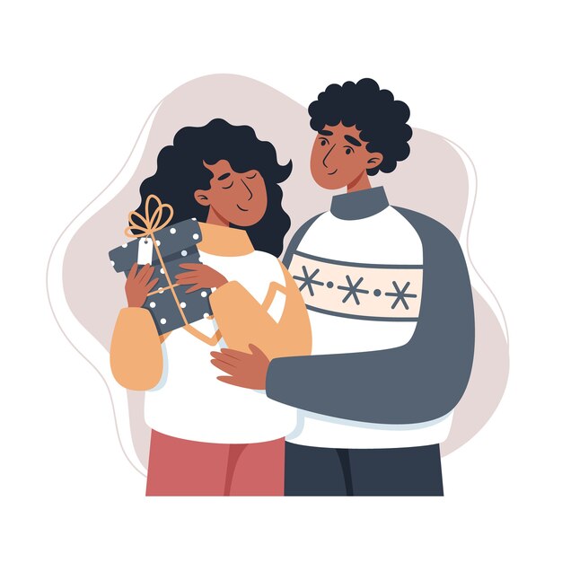 Girl and boy holding a gift