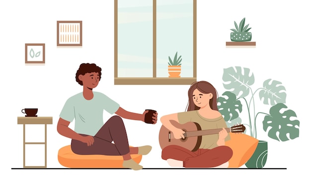 Girl and guy playing guitar