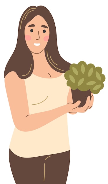 Девушка держит в руках растение в горшке.