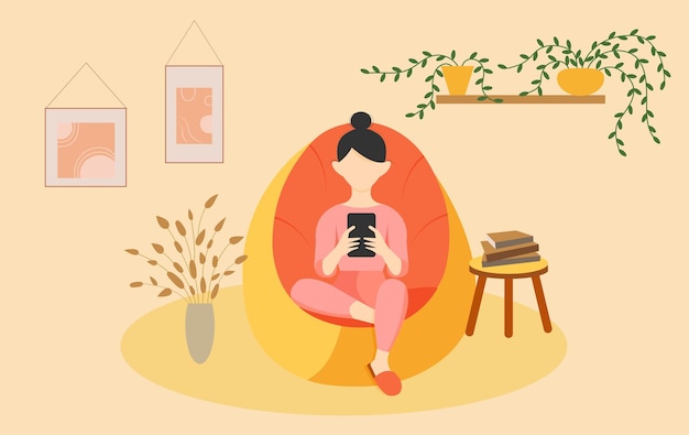 a girl sits in a beanbag with a phone.Makes online purchases,corresponds,learns online.room interior