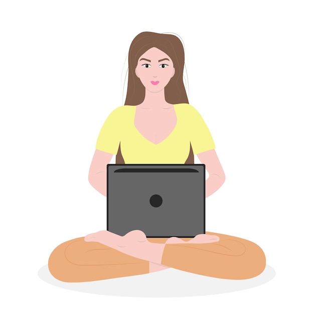 Girl sitting with laptop in lotus position Young woman working on the notebook