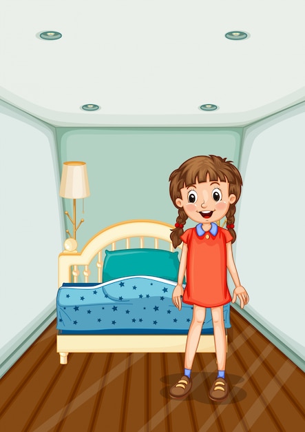 Girl standing in bedroom with blue bed