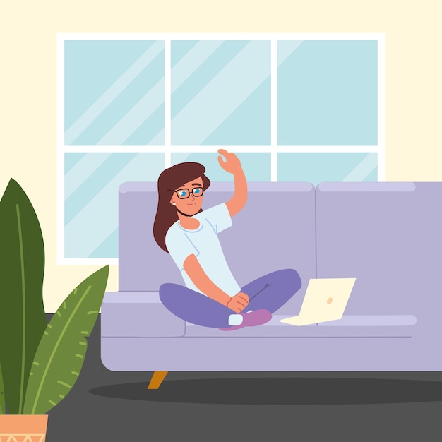 Girl using laptop on sofa