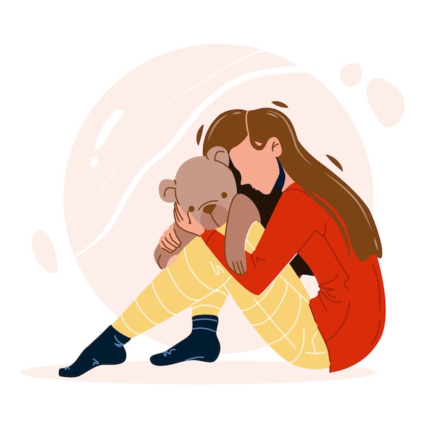 girl with trauma embracing teddy bear toy