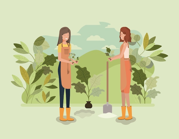 Girls planting trees in the park