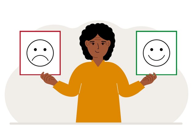 Glimlachende vrouw houdt een kaart vast met een trieste emoji in de ene hand en een lachende emoji in de andere hand Het concept van emotiesmaskers of psychologische hulp