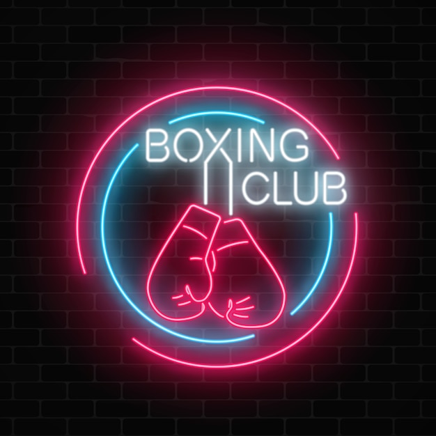 Club di boxe al neon incandescente segno in cornici di cerchio sul muro di mattoni scuro cartello al neon di club di combattimento.