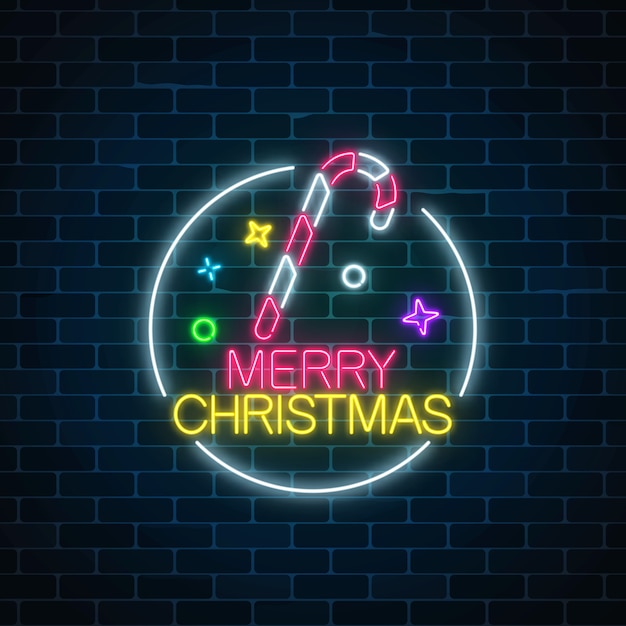 Glowing neon christmas sign with christmas candy cane in circle frame.