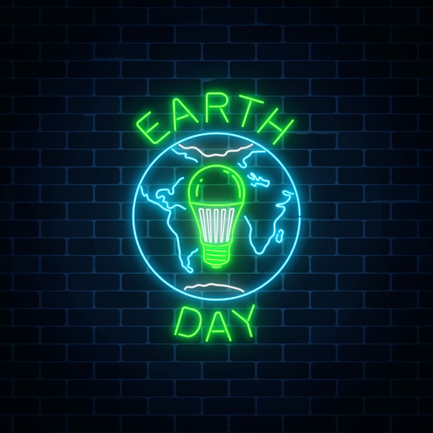 地球のシンボルと内部の緑のled電球と世界の地球の日の輝くネオンサイン。