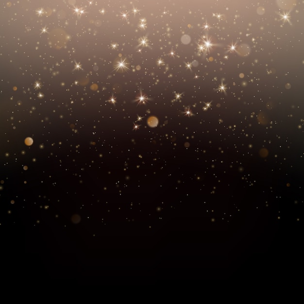 Gold glittering star dust sparkling particles on dark background. 