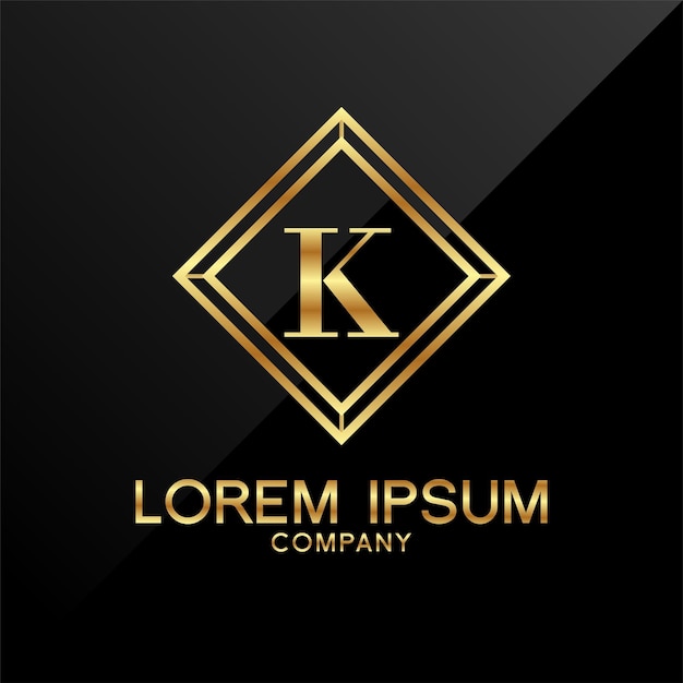 a gold square with the letter k in the middle