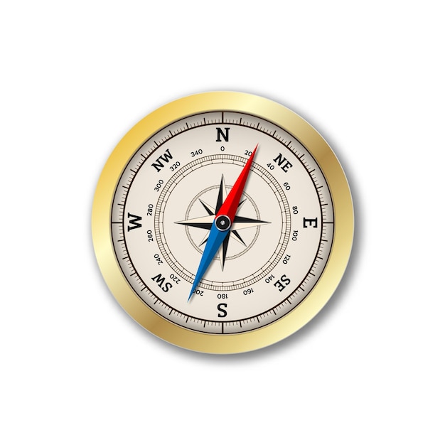 a gold and white compass that says  new  on the top