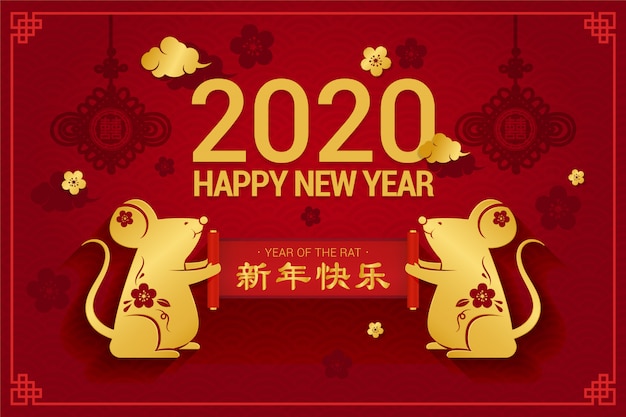 スクロールを保持している2匹のラットと黄金の中国の新年のコンセプト