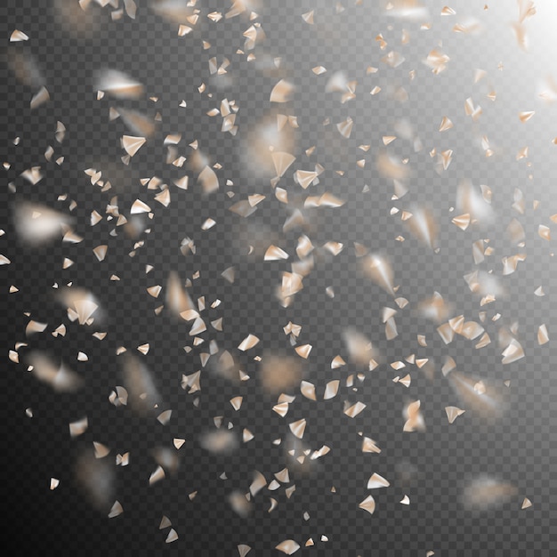 Golden confetti isolated on dark.