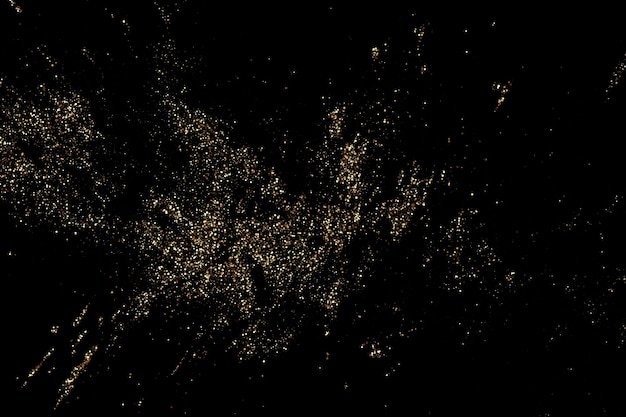 黒の背景に分離された金色のキラキラ テクスチャ黄金色の粒子紙吹雪の黄金の爆発お祭りの背景デザイン要素