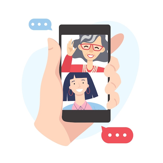 スマートフォンを使ってビデオ通話をしている祖母と孫娘