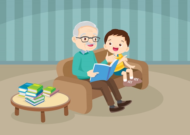 Grandparents with grandchildren reading on sofa