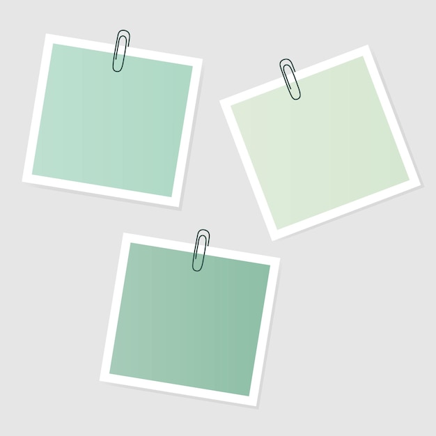 Graphic vector illustration of blank green cards on paper clips on a gray background