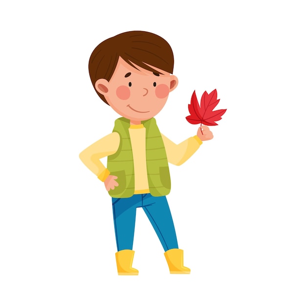 Grappig jongen personage in rubberen laarzen die herfstblad vector illustratie vasthoudt